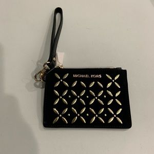 Michael Kors wristlet black suede/gold grommets